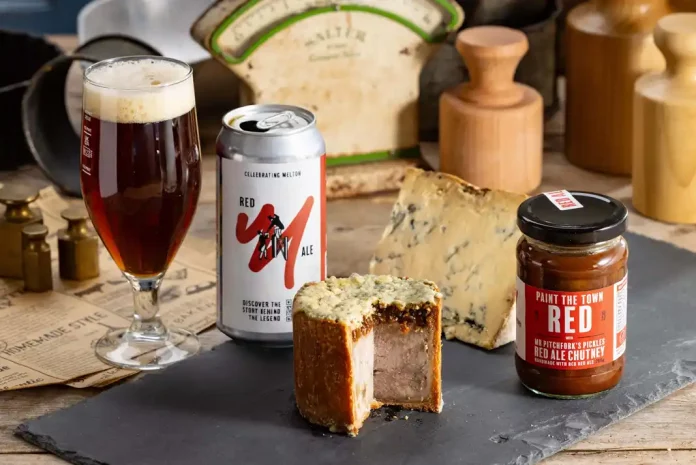 Beer, pie, cheese, and chutney arrangement