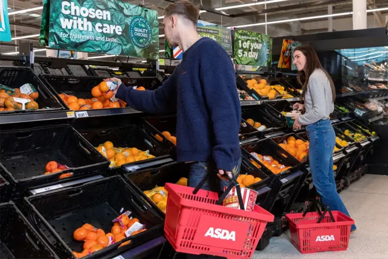 Shopping for oranges in supermarket.
