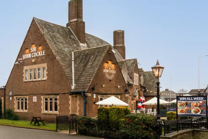 sirjohncockle Sir John Cockle pub building with outdoor seating in Mansfield
