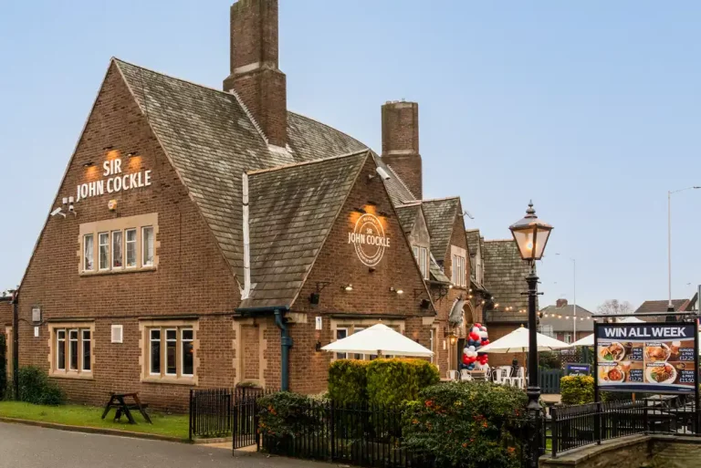 Sir John Cockle pub building with outdoor seating in Mansfield
