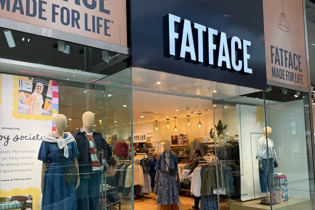 Clothing store with mannequins displayed.