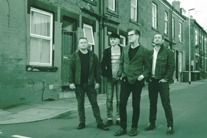 Four men standing on street