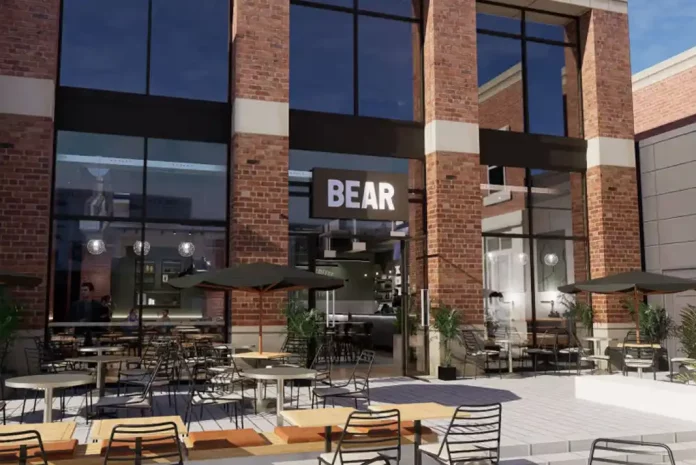 Modern cafe with outdoor seating area.