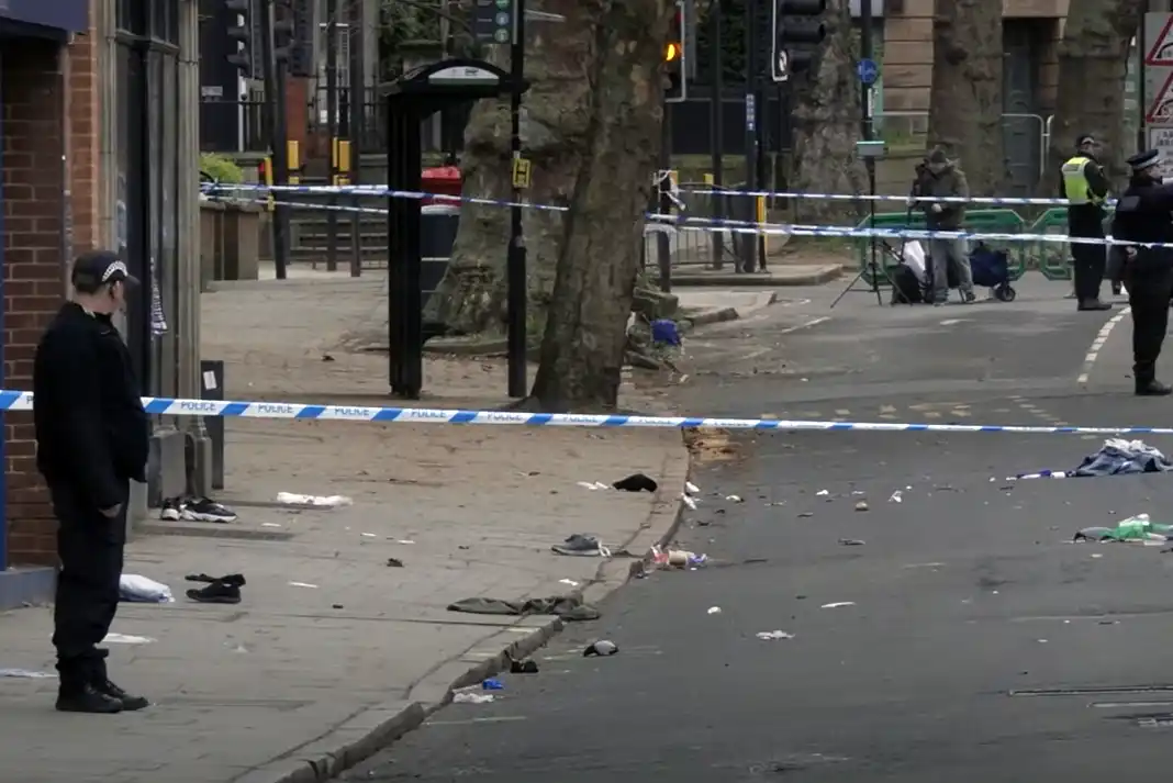 Police scene with debris and cordon
