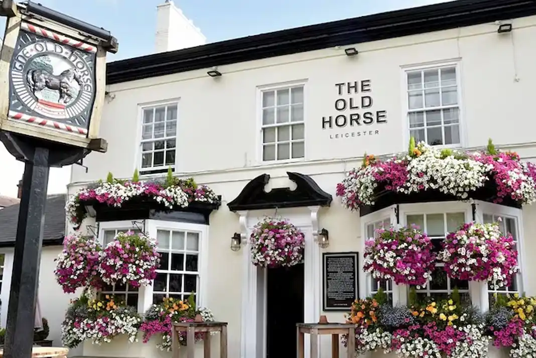 oldhorse Charming pub the Old Horse with colourful flowers.