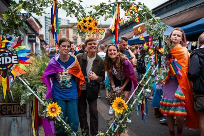 Colorful celebration with joyful participants.