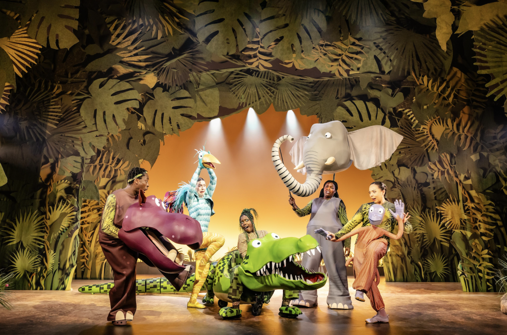 Colorful jungle-themed stage performance