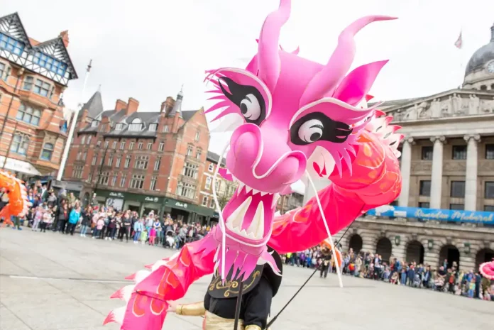 Colorful dragon puppet at festival