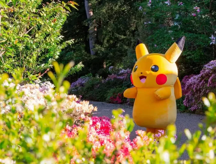 Pikachu in a colorful garden.